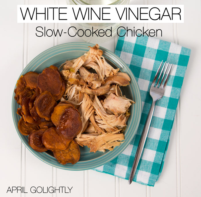 White wine chicken on a plate with homemade chips 