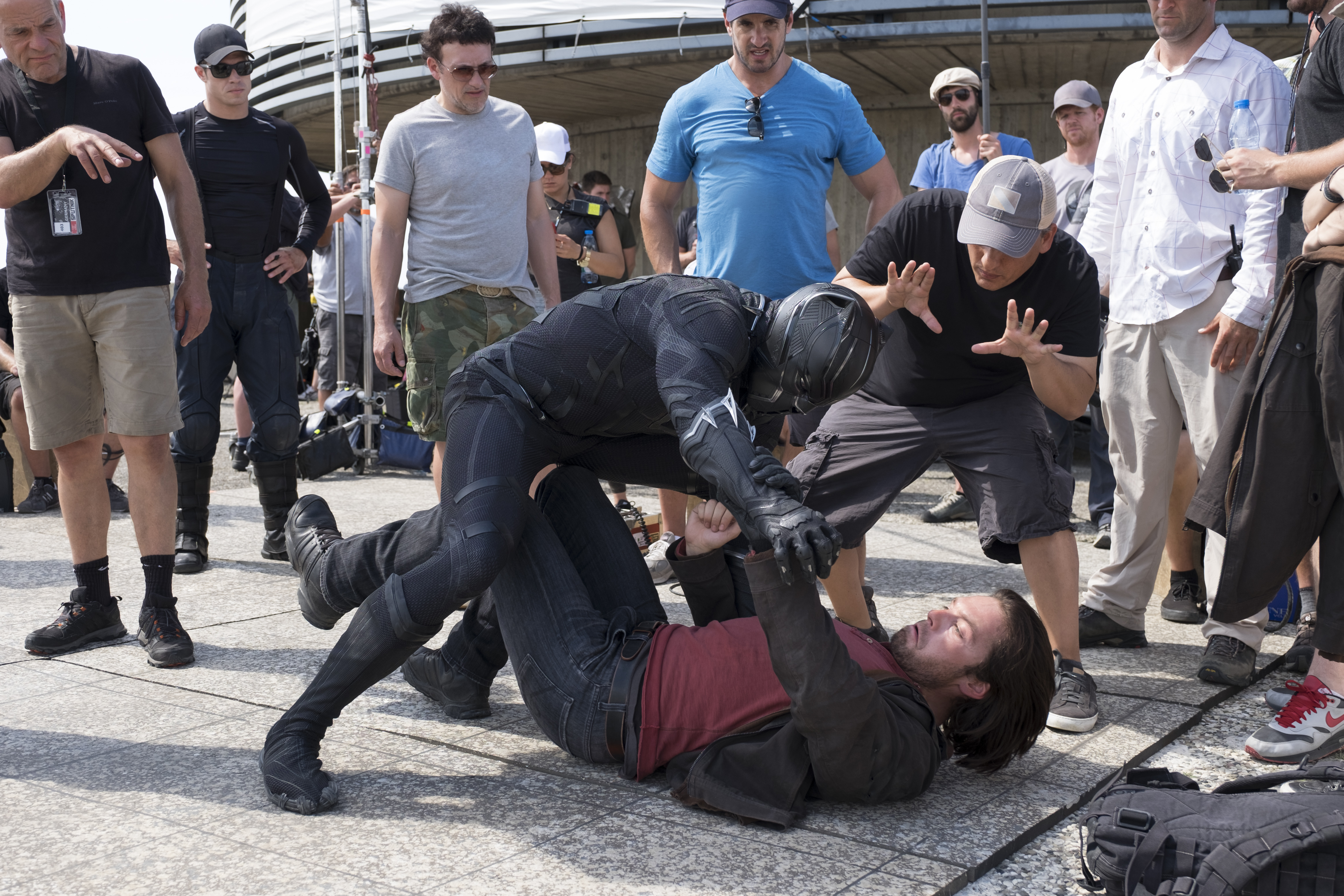 Marvel's Captain America: Civil War L to R: Director Anthony Russo, Chadwick Boseman (Black Panther), Sebastian Stan (Winter Soldier) and Director Joe Russo filming a scene on set. Photo Credit: Zade Rosenthal © Marvel 2016