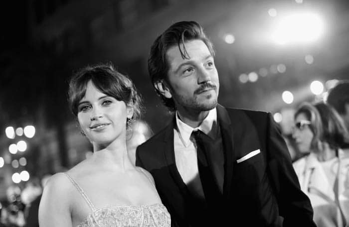 HOLLYWOOD, CA - DECEMBER 10: (EDITORS NOTE: Image has been shot in black and white. Color version not available.) Actors Felicity Jones (L) and Diego Luna attend The World Premiere of Lucasfilm's highly anticipated, first-ever, standalone Star Wars adventure, "Rogue One: A Star Wars Story" at the Pantages Theatre on December 10, 2016 in Hollywood, California. (Photo by Charley Gallay/Getty Images for Disney) *** Local Caption *** Diego Luna; Felicity Jones
