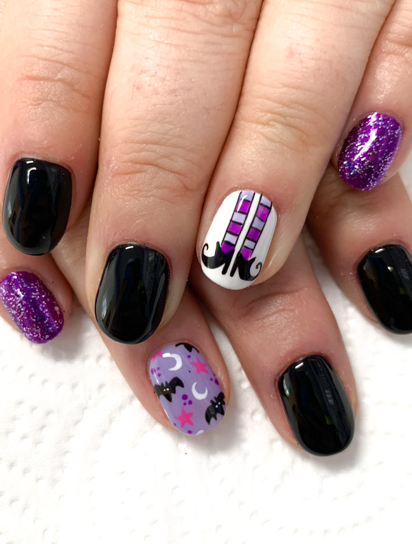 Halloween Nail Art with Bats and witch legs and feet 